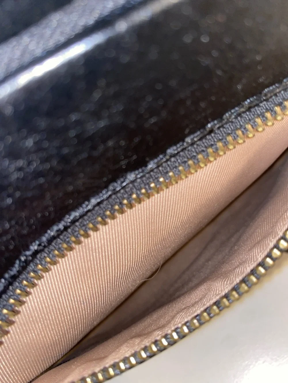 The Sak Sanibel Black Leather Floral Embossed Mini Crossbody w/ Gold Hardware - Picture 7 of 11